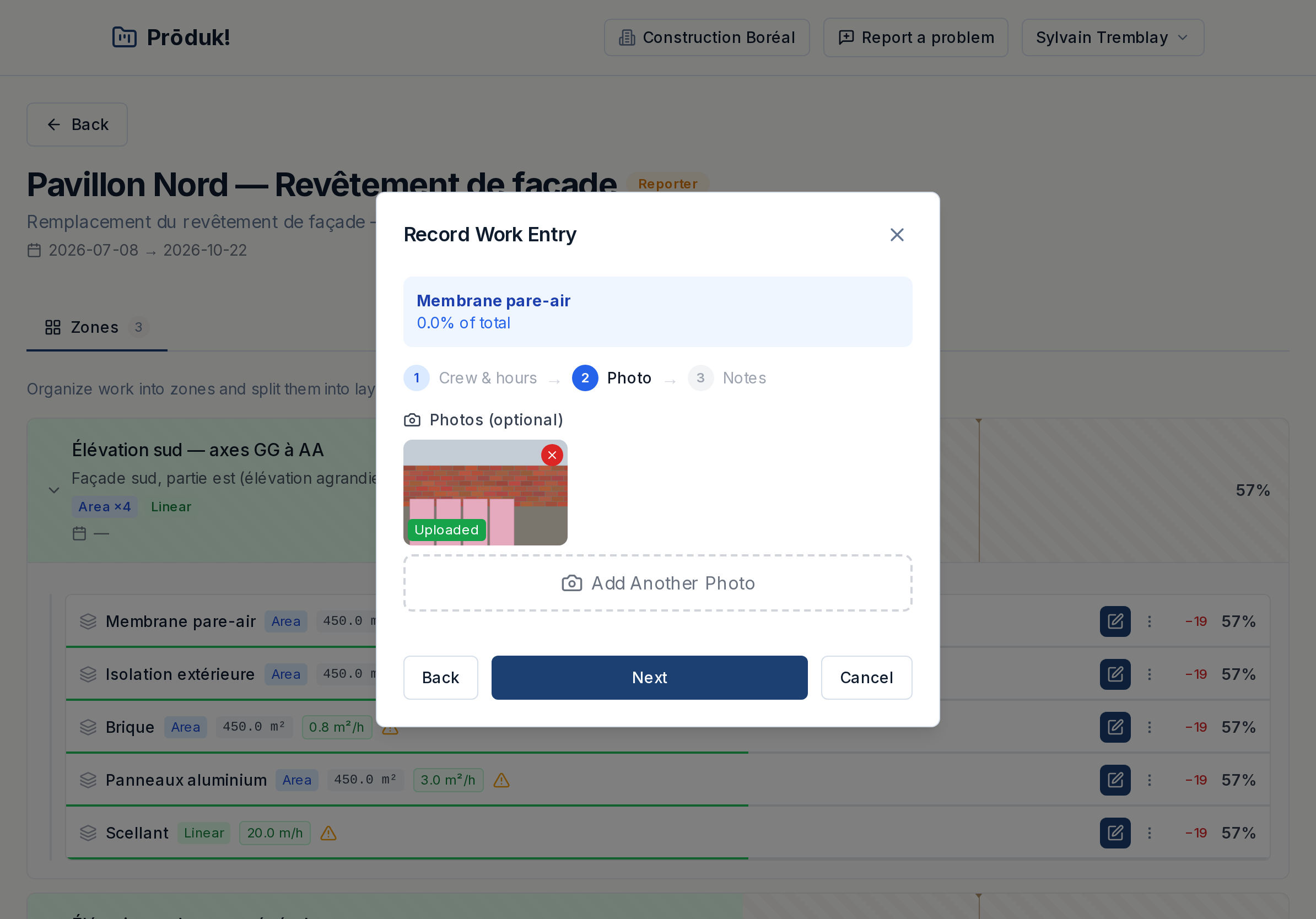 Record work entry dialog, step two: a site photo attached and marked uploaded